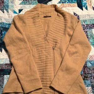 Tan Cashmere sweater with offset zipper.
